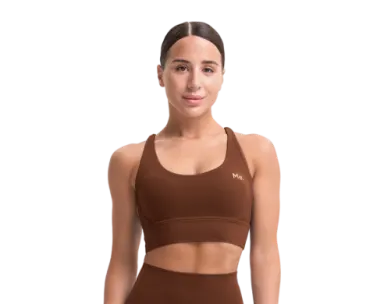 Mulher adulta (30-39 anos) fazendo Pilates